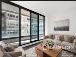 STYLISH SOUTH YARRA APARTMENT WITH POOL, BALCONY AND GYM