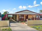 SPACIOUS, LOW-MAINTENANCE HOME WITH LARGE SHEDS & VERANDAHS
