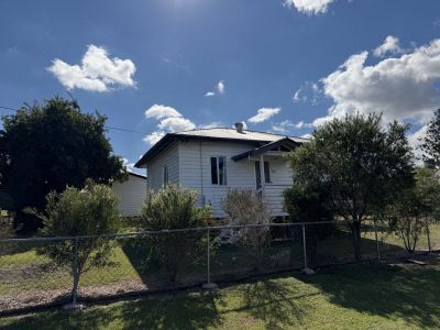 RENOVATED COTTAGE OFFERING COMFORT, CONVENIENCE & VALUE