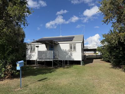 CHARMING LOW-SET HOME IN A CONVENIENT TOWN LOCATION