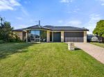 COASTAL COMFORT WITH ROOM FOR THE WHOLE FAMILY