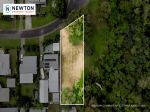 A GENEROUS COASTAL HOMESITE WITHIN WALKING DISTANCE OF BEACH AND VILLAGE