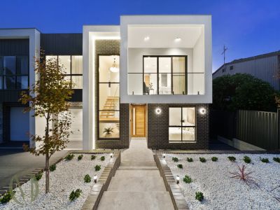 ELEGANT TWO-LEVEL LIVING WITH SPACE, STYLE & CONVENIENCE