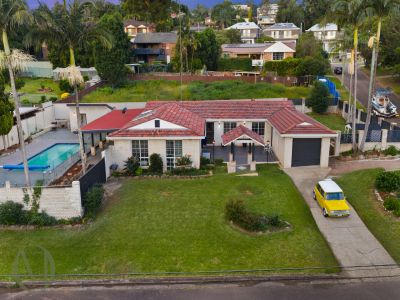 FULLY RENOVATED FAMILY ENTERTAINER ON PRIME CORNER BLOCK!