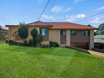 SPACIOUS FAMILY HOME WITH TRIPLE CAR GARAGE