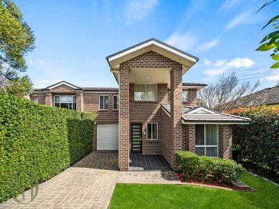STYLISHLY UPDATED FIVE-BEDROOM FAMILY HOME WITH TREE-TOP DECK RETREAT