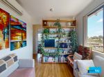 TOP-FLOOR LIVING IN THE HEART OF EAST VIC PARK