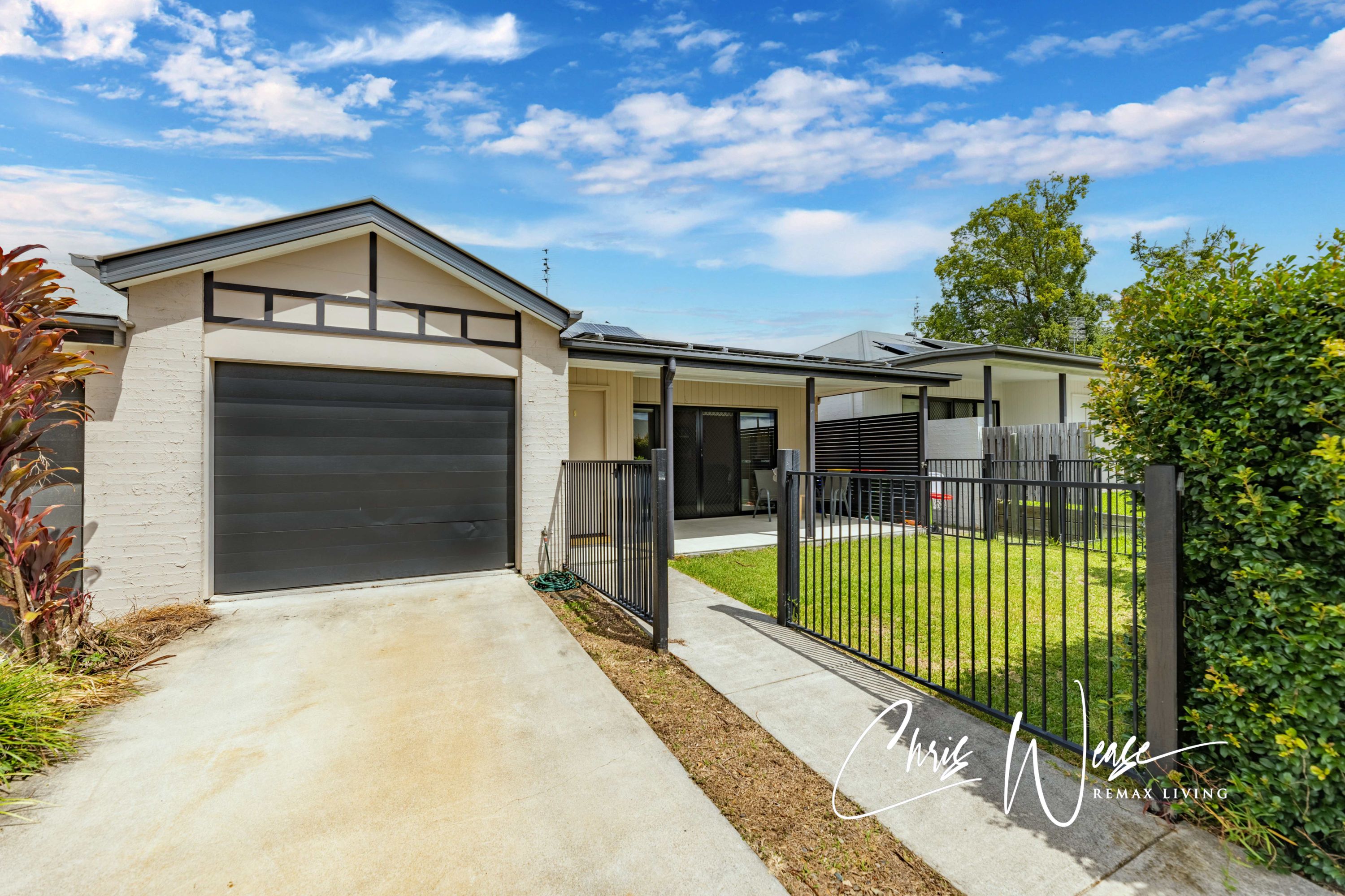 LOW-MAINTENANCE LIVING IN THE HEART OF WOODFORD