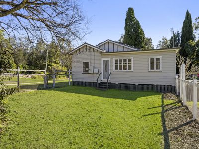 TIDY COLONIAL HOME ON ACREAGE
