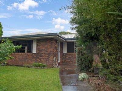 BRICK HOME THAT EFFORTLESSLY BRINGS TIMELESS CHARM