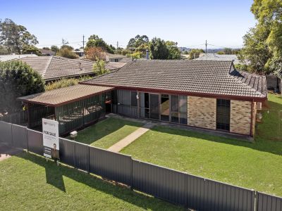 SPACIOUS FAMILY LIVING WITH MULTIPLE LIVING AREAS & GENEROUS BACKYARD