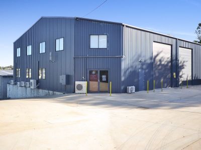 MODERN FACILITY WITH OFFICES + WAREHOUSE