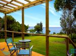 RUSTIC LOG CABIN WITH LARGE FRONT DECK TO CAPTURE THE STUNNING VIEWS