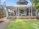 MODERN HOME IN A PRIME BEACHSIDE LOCATION!