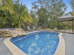 EXPANSIVE FAMILY ENTERTAINER WITH POOLSIDE LIVING!