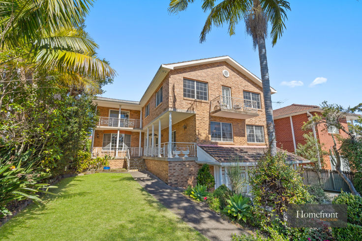 MAGNIFICENT MASTER-BUILT FULL-BRICK FAMILY HOME