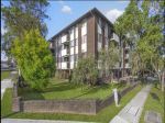 TOP FLOOR UNIT IN A QUIET & CONVENIENT LOCATION