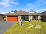 SPACIOUS COASTAL FAMILY LIVING WITH EXCEPTIONAL ENTERTAINING