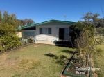 NEAT, WELL-PLANNED HOME WITH EXCEPTIONAL SHED SPACE