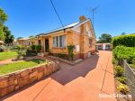 COMFORTABLE BRICK LIVING WITH SPACE TO SPARE