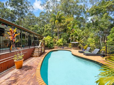DUAL LIVING ON PRIVATE COASTAL ACREAGE - CLOSE TO TOWN AND BEACH!