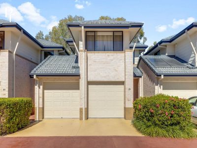 RELAXED LAKESIDE LIVING IN A SOUGHT-AFTER GATED COMMUNITY