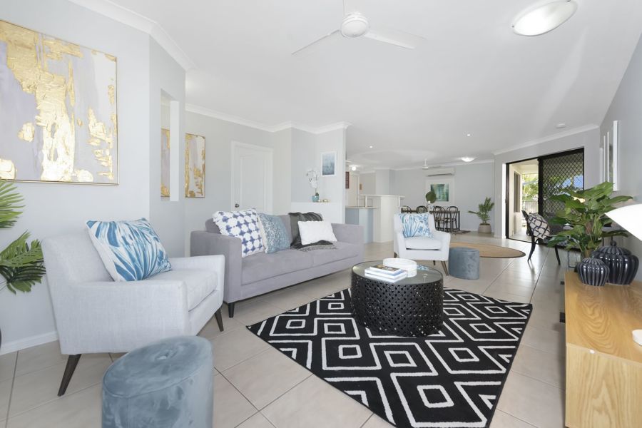 EXPANSIVE, CAREFREE, BEACHSIDE LIVING AT ITS VERY BEST