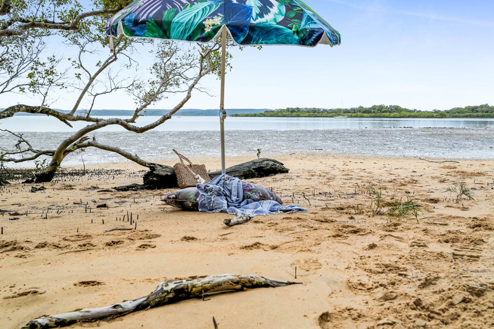 A LANDMARK WATERFRONT RETREAT - ONE OF MACLEAY ISLAND'S FINEST RESIDENCES