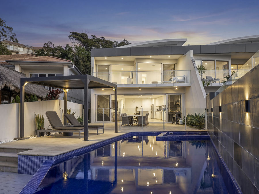 EXCLUSIVE BOUTIQUE BEACHFRONT HOME...