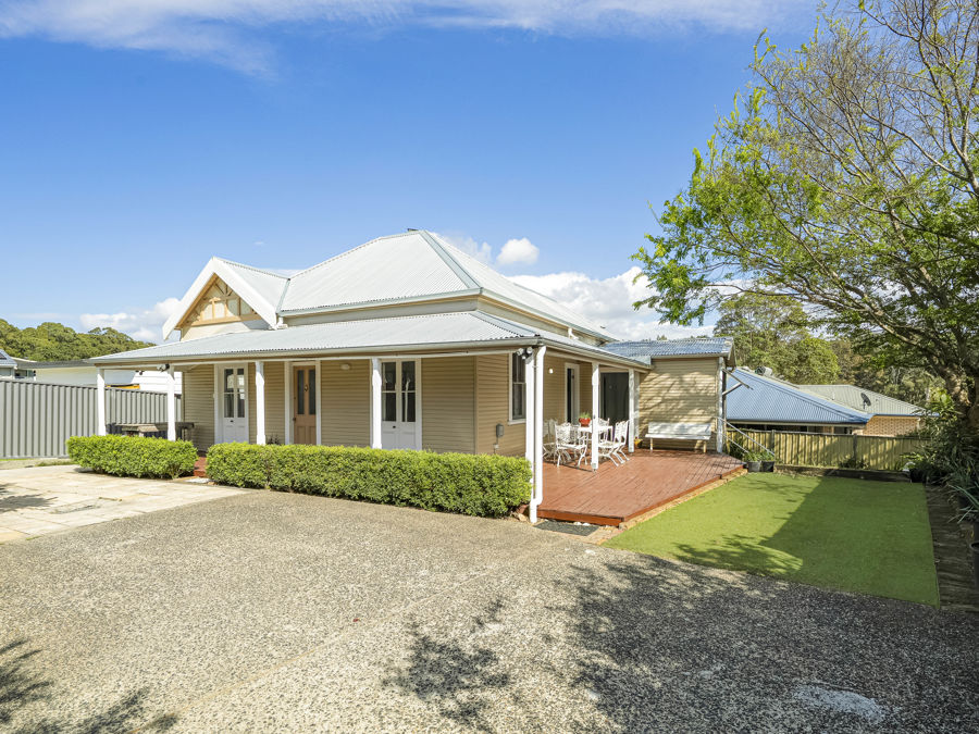 HISTORIC THREE-BEDROOM HOME WITH COASTAL CHARM...