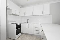 2 BEDROOM TOP FLOOR UNIT IN CONVENIENT LOCATION