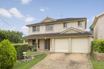 IMMACULATELY DESIGNED HOME