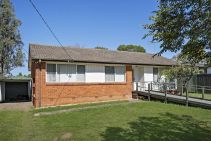 STYLISH TURN-KEY LIVING WITH PRIVATE STUDIO