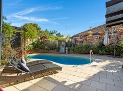 TRANQUIL FAMILY OASIS WITH POOL, RESERVE BACKDROP & EFFORTLESS ENTERTAINING