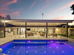 A LUXE, PRIVATE ACREAGE SANCTUARY OF REFINED FAMILY LIVING IN MUDGEERABA