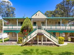 A RARE ACREAGE OPPORTUNITY WITH ENORMOUS RENOVATION POTENTIAL