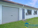 LOWSET TWO-BEDROOM UNIT WITH MODERN KITCHEN & SINGLE GARAGE