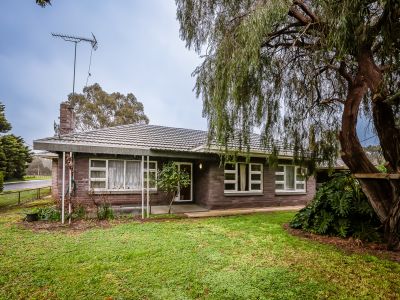 SOLID BRICK HOME WITH PLENTY OF POTENTIAL