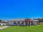 CONTEMPORARY COUNTRY LIVING ON EXPANSIVE FLAT ACREAGE